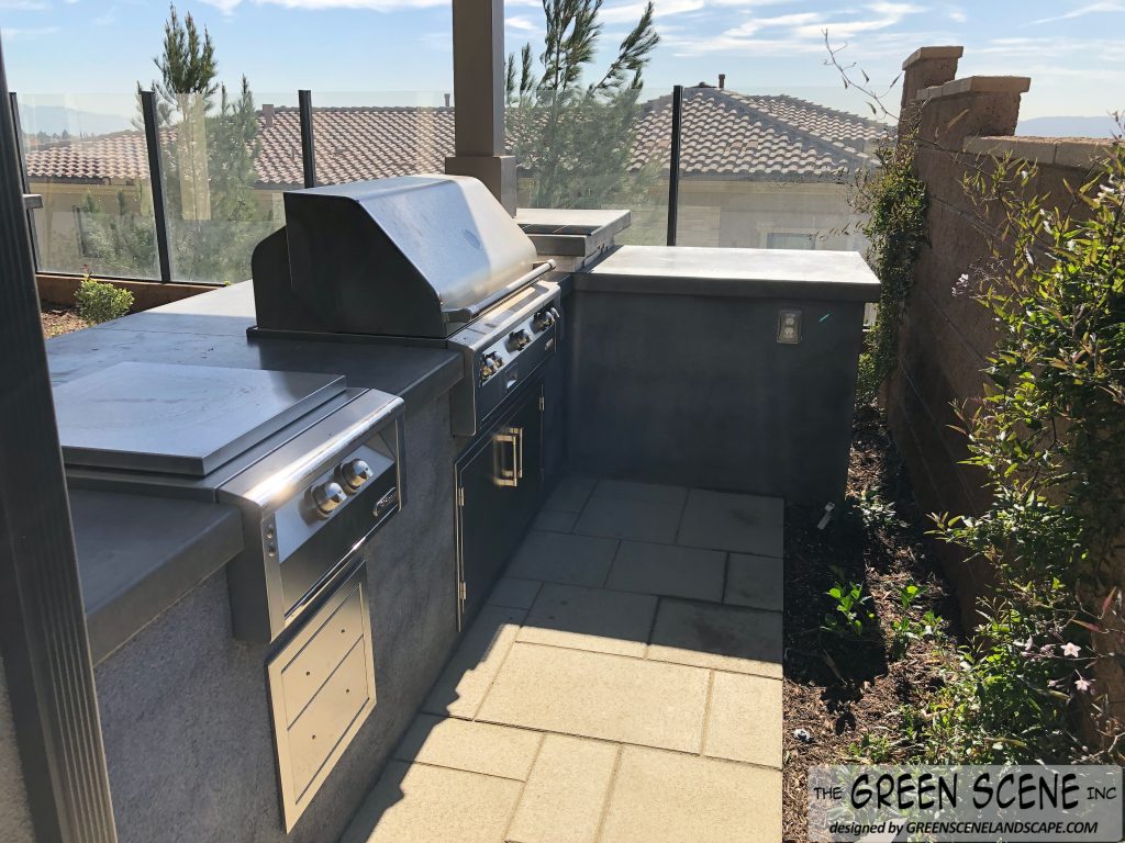 outdoor kitchen will grill and landscaping